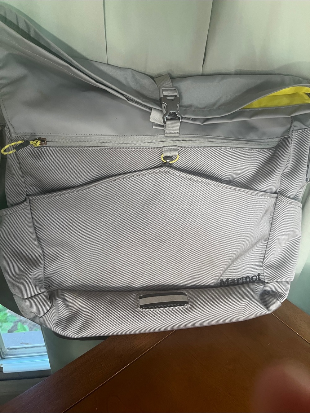 Marmot Light Gray Roll-Top Laptop Messenger Bag with Yellow Accents